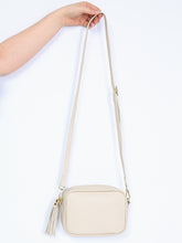 Leather bag with fringe pendant
